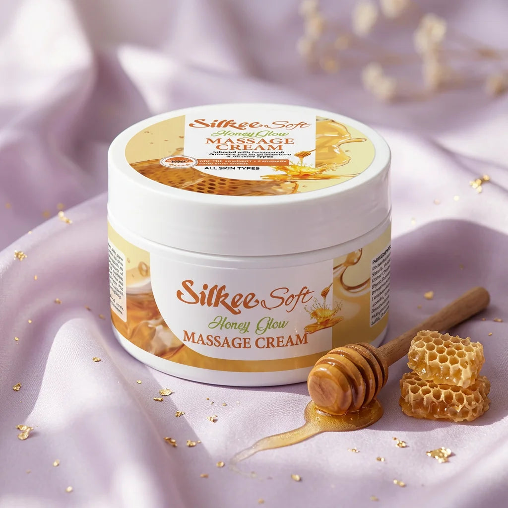 Honey Glow Massage Cream on lilac silk with honeycomb